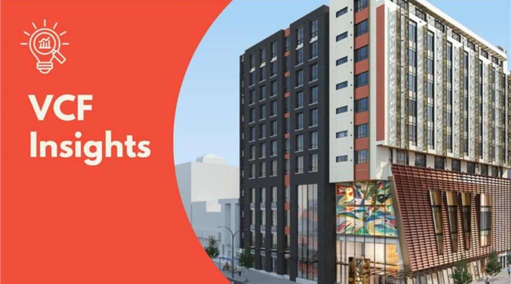VCF Insights banner featuring multi-story building with a lightbulb analytics icon and orange design background